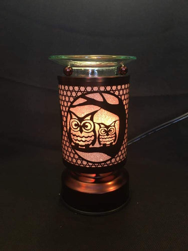 small bronze touch lamp with two owls on a branch and wax melter