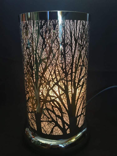large silver touch lamp with trees